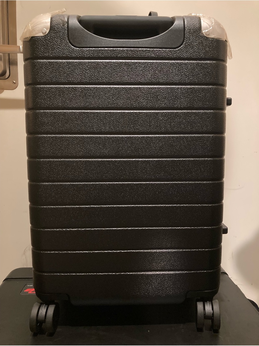Away Black Textured Hardshell Carry-On with Spinner Wheels